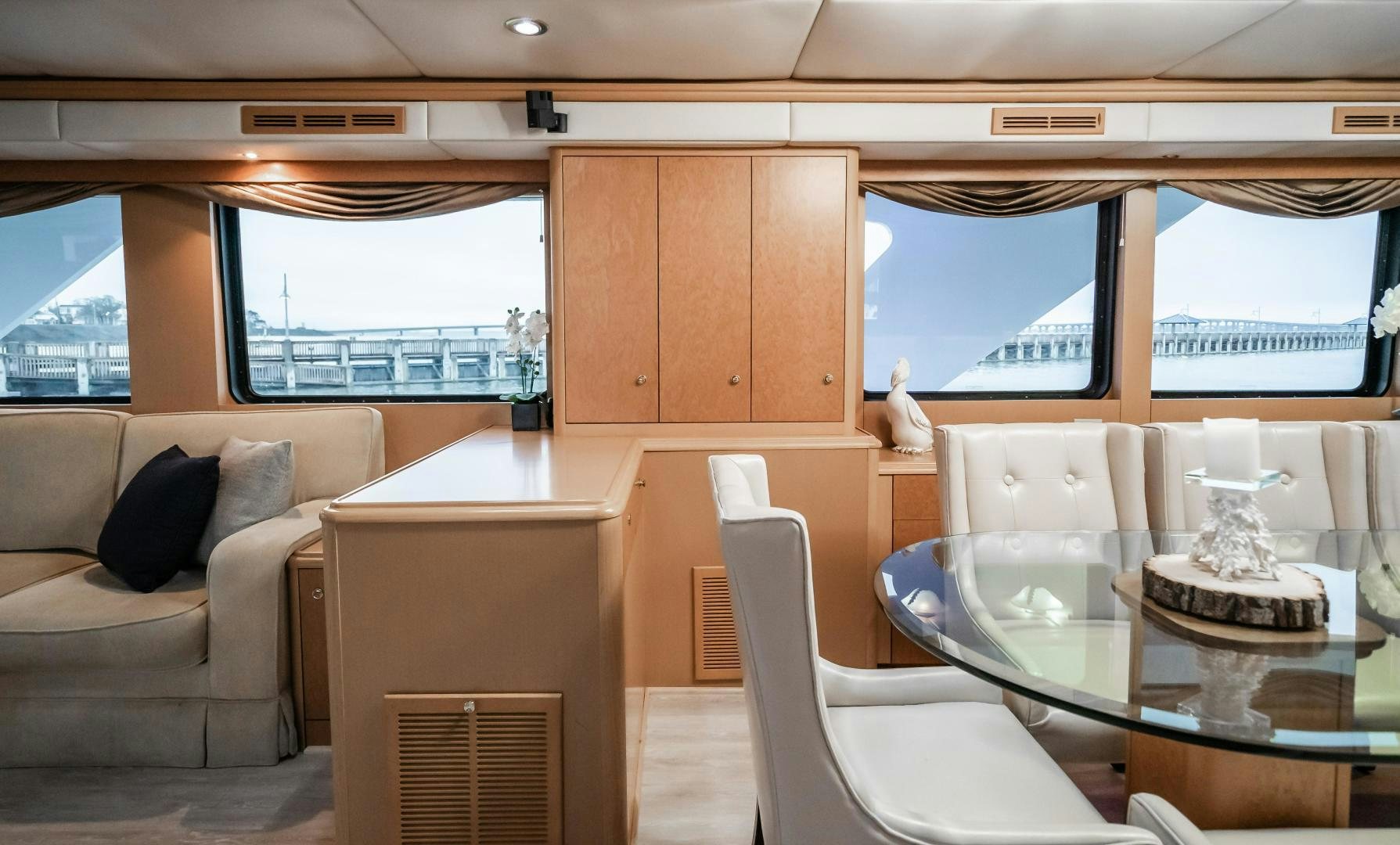 a room with a table and chairs aboard COME MONDAY Yacht for Sale