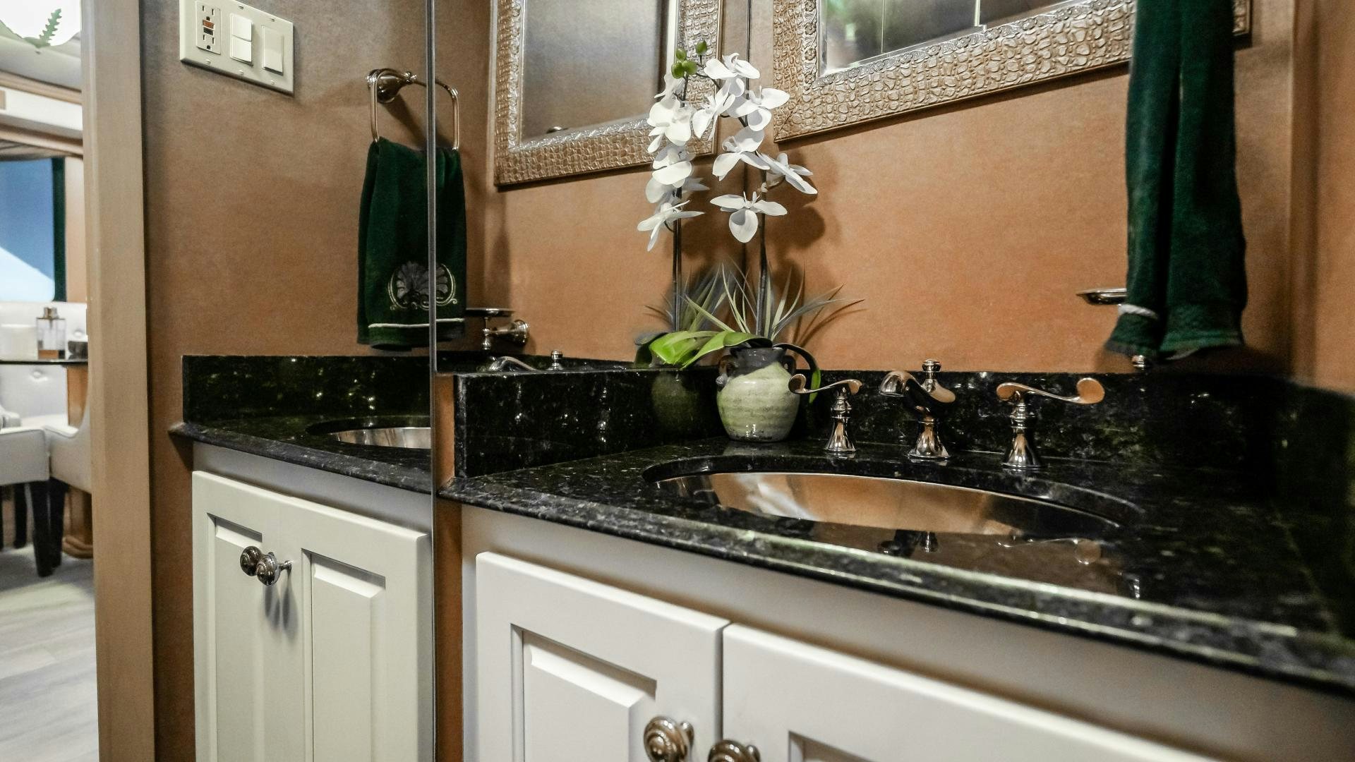 a kitchen with a black countertop aboard COME MONDAY Yacht for Sale
