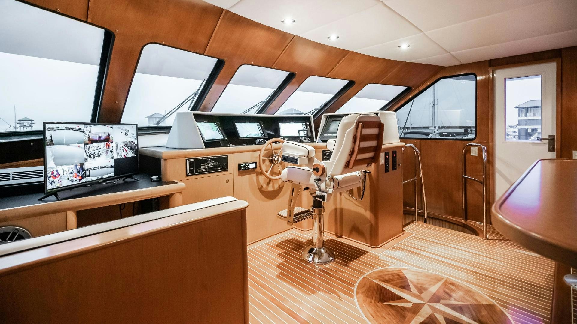 a room with a desk and computer aboard COME MONDAY Yacht for Sale