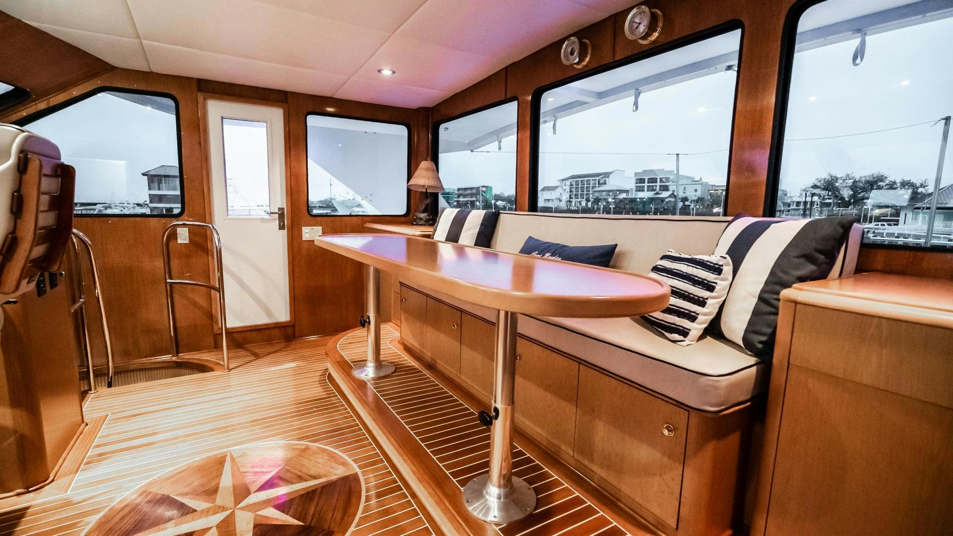 a room with a table and chairs aboard COME MONDAY Yacht for Sale