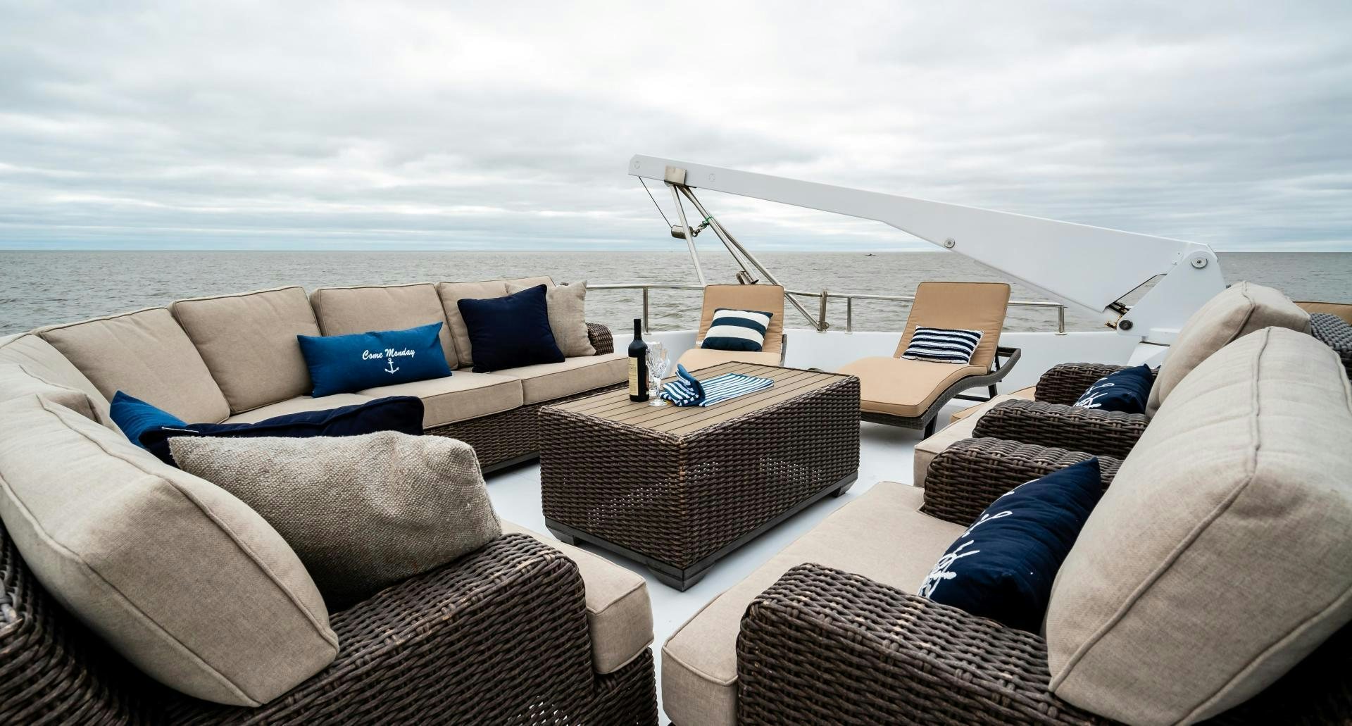 a living room with a large beach aboard COME MONDAY Yacht for Sale