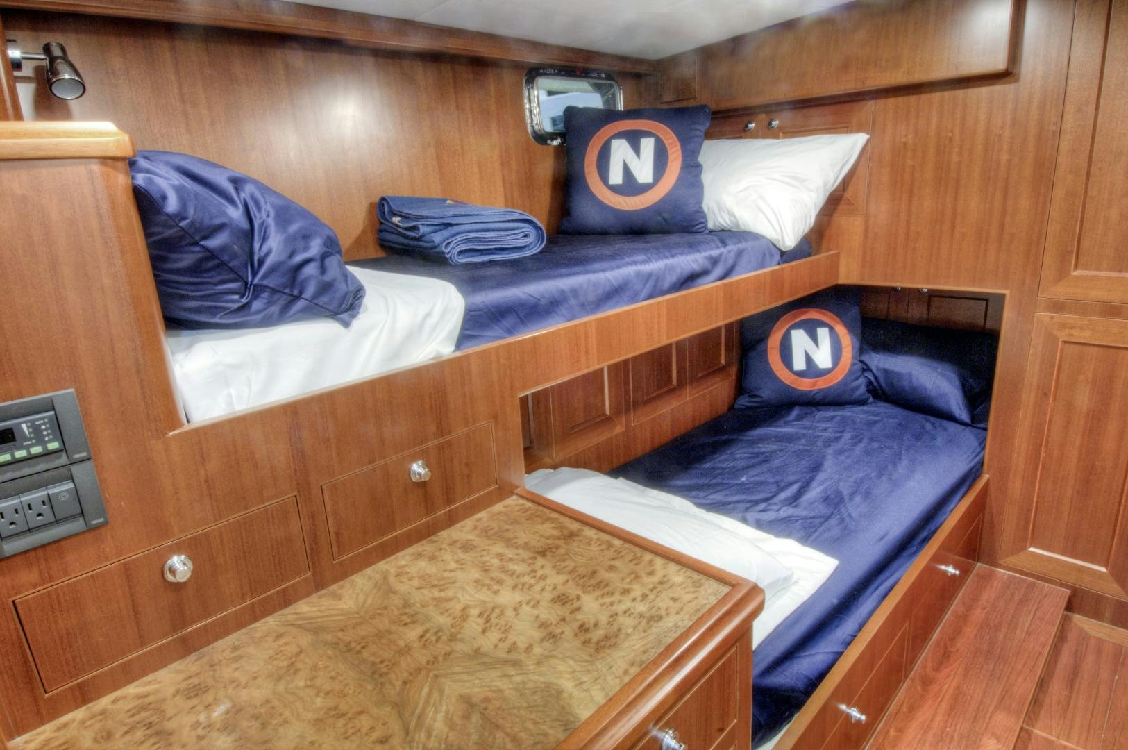 a couple beds in a room aboard No Name Yacht for Sale
