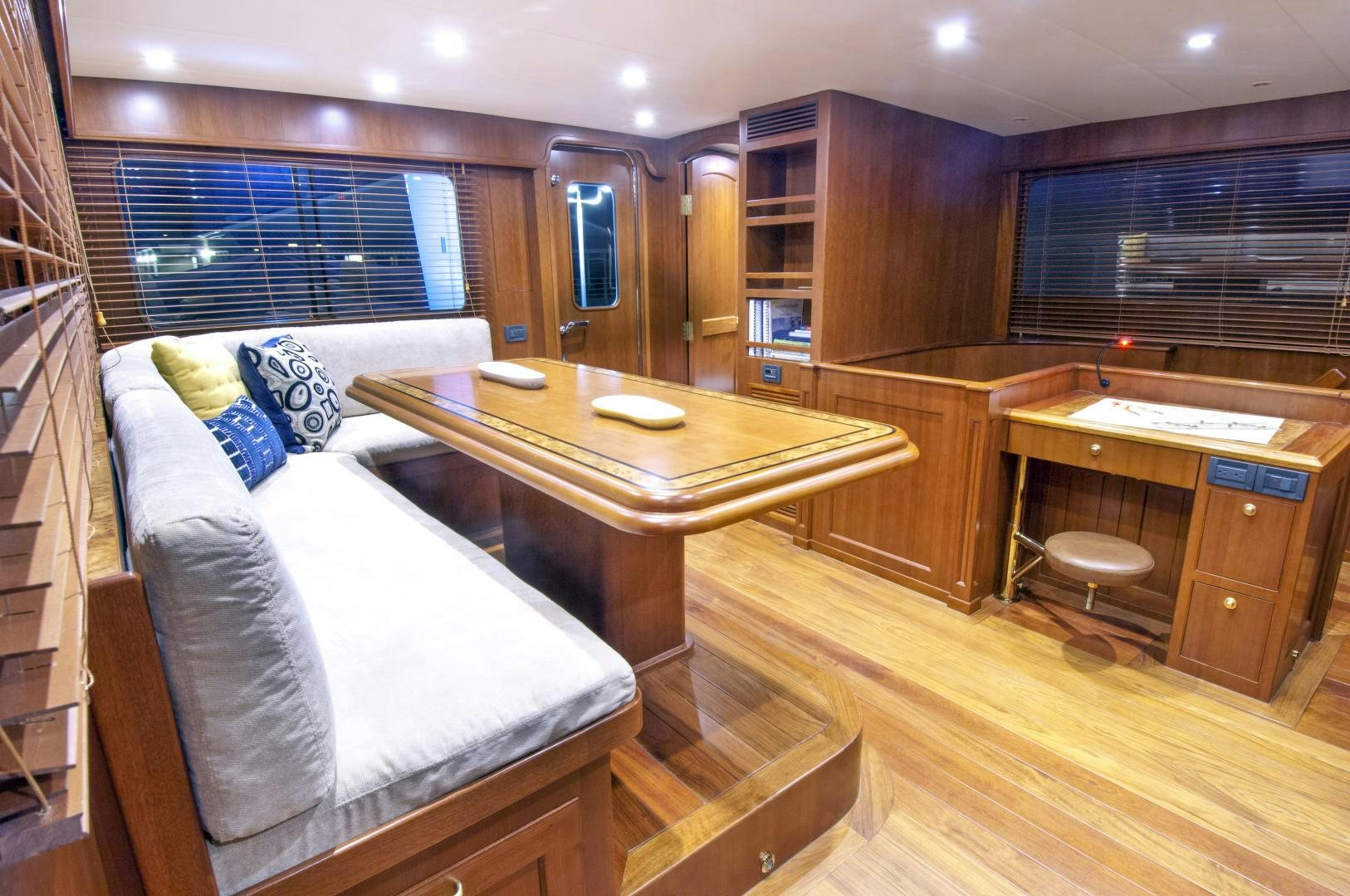 a room with a bed and a table aboard No Name Yacht for Sale
