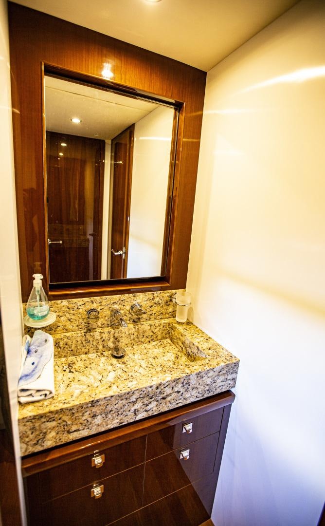 a bathroom with a marble counter top aboard LAS BRISAS Yacht for Sale