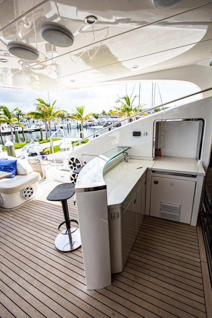 a kitchen with white cabinets aboard LAS BRISAS Yacht for Sale