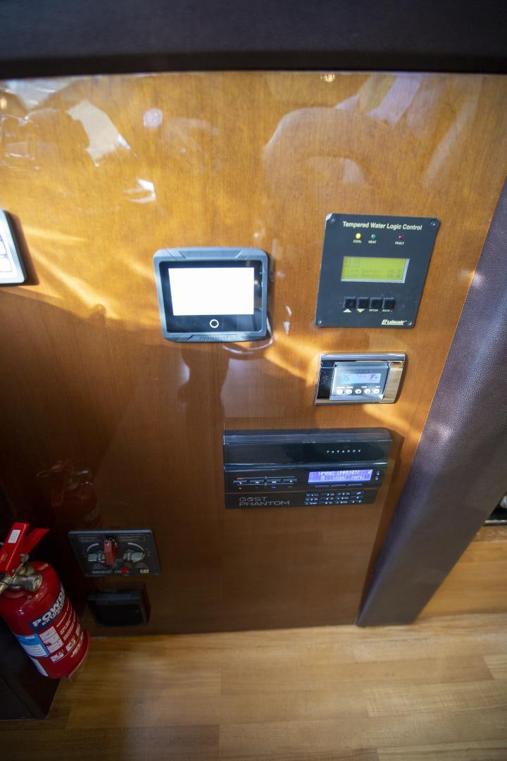a group of cell phones on a table aboard LAS BRISAS Yacht for Sale