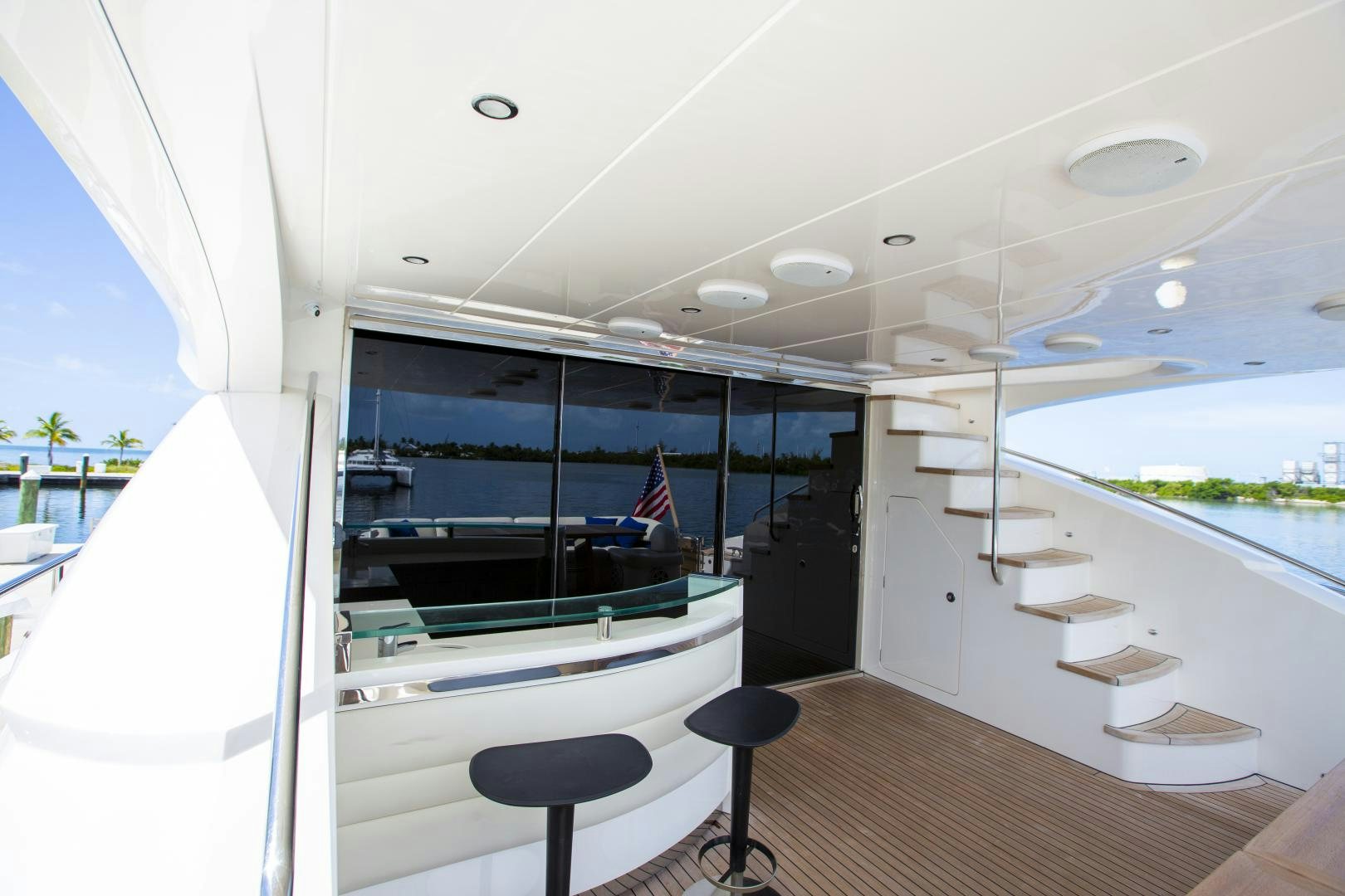 a room with a large window and a pool table aboard LAS BRISAS Yacht for Sale