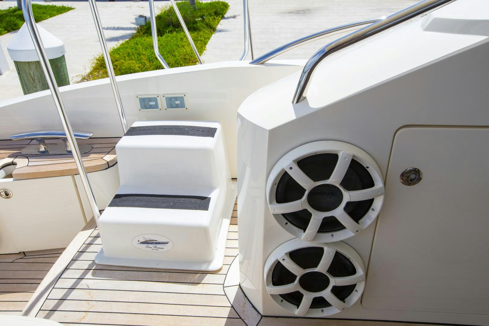 a white car with a black and white design on the front aboard LAS BRISAS Yacht for Sale