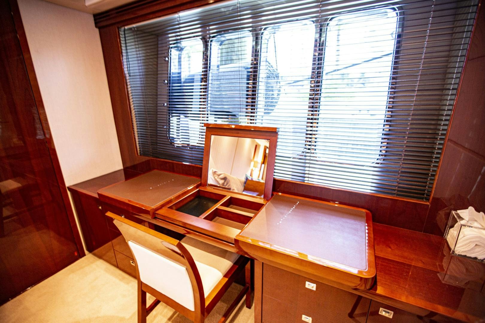 a room with a table and chairs aboard LAS BRISAS Yacht for Sale