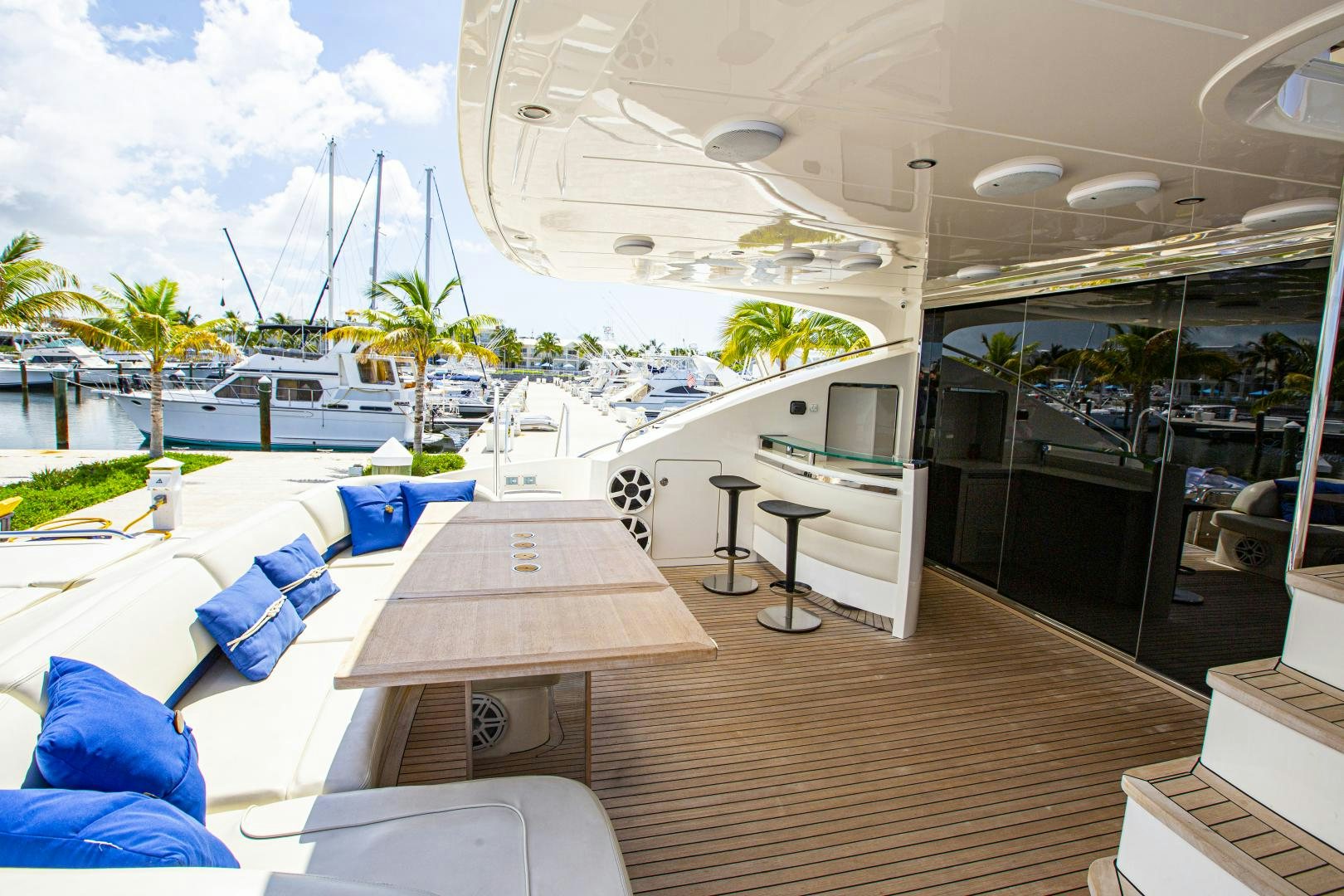 a room with a table and chairs aboard LAS BRISAS Yacht for Sale