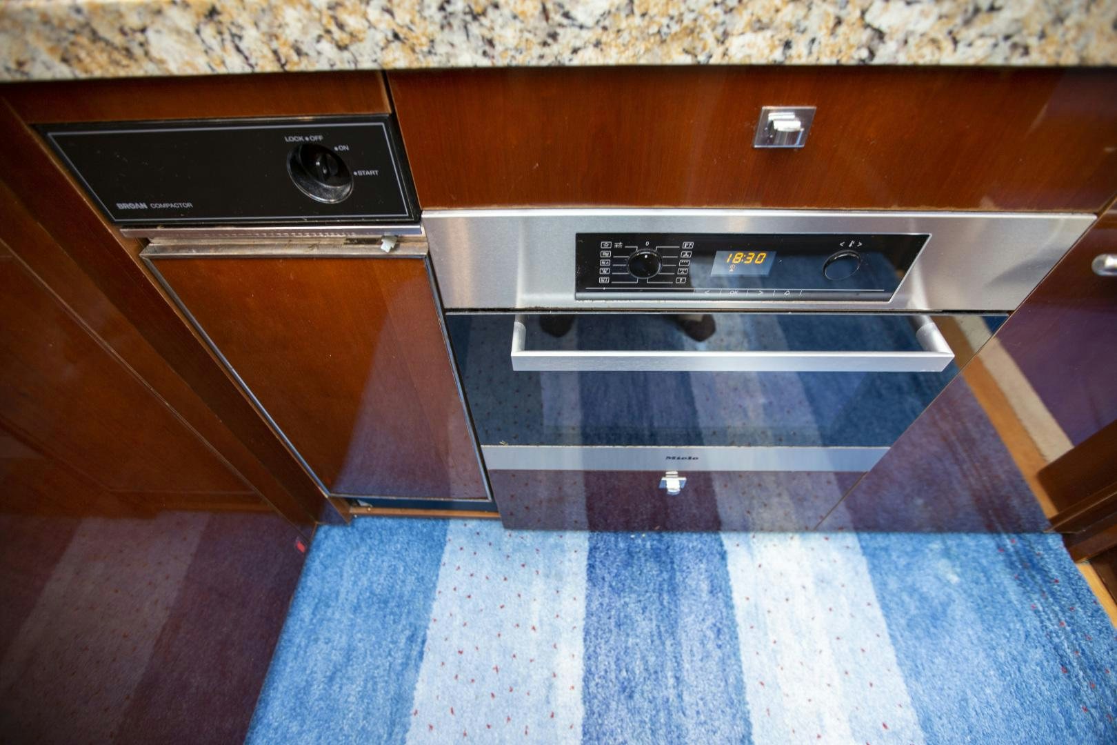 a kitchen with a stove and oven aboard LAS BRISAS Yacht for Sale