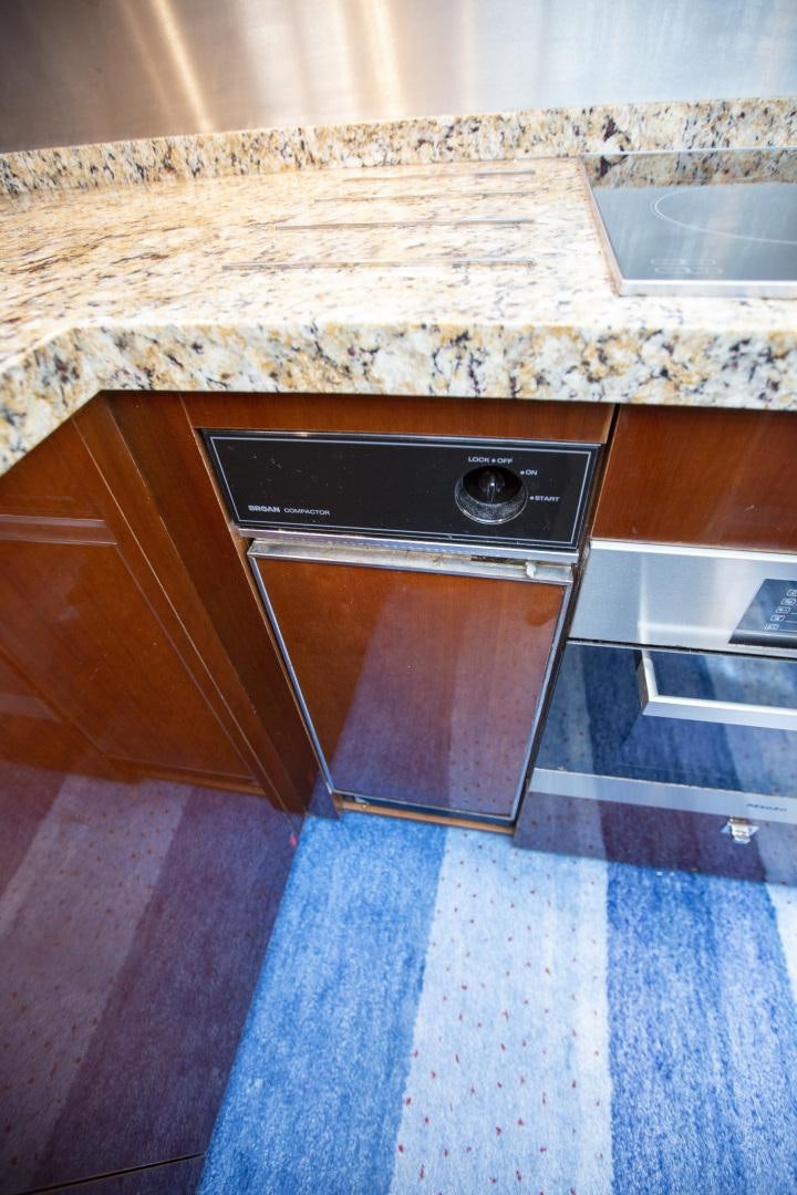 a kitchen with a marble counter top aboard LAS BRISAS Yacht for Sale