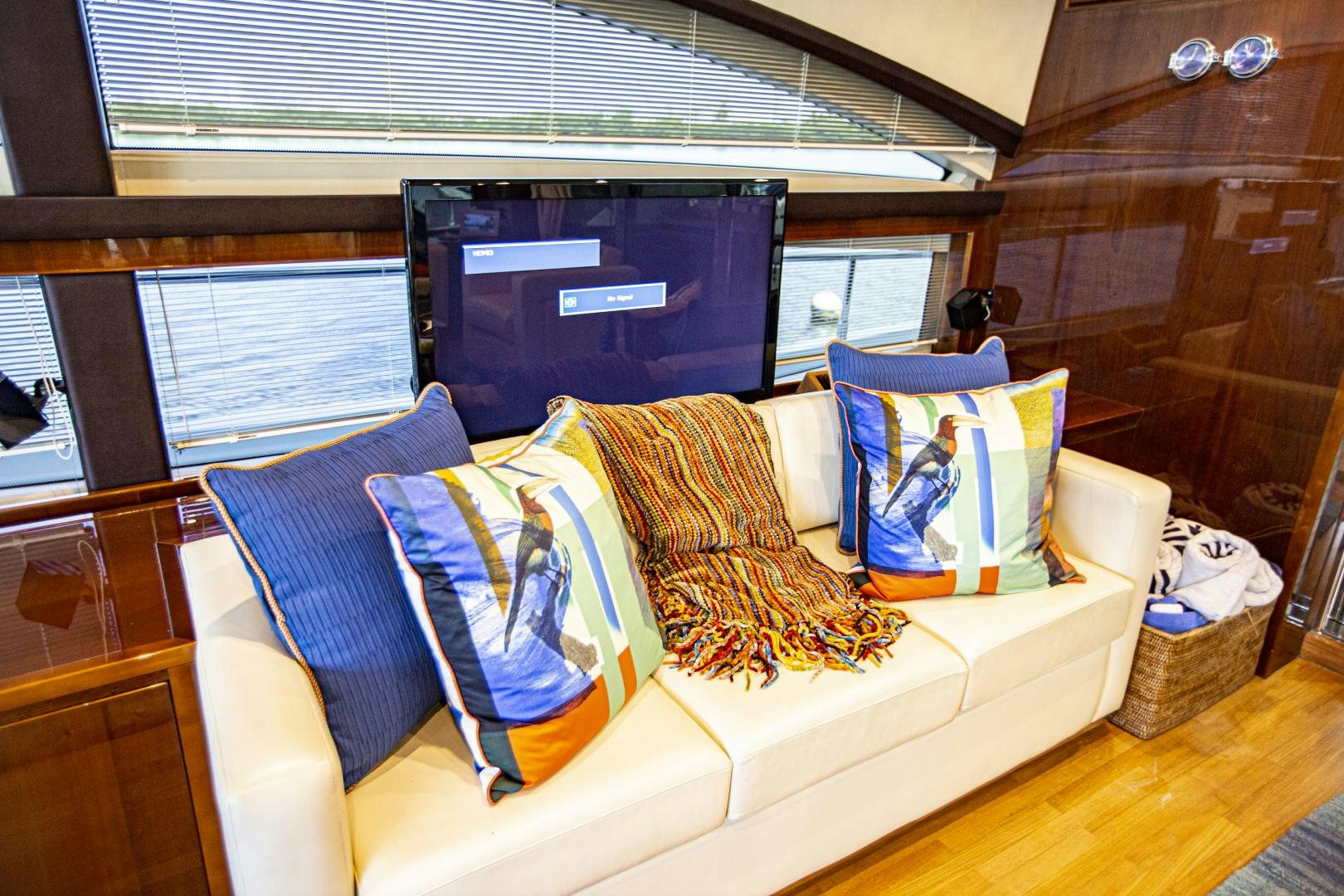 a living room with a couch and a fireplace aboard LAS BRISAS Yacht for Sale