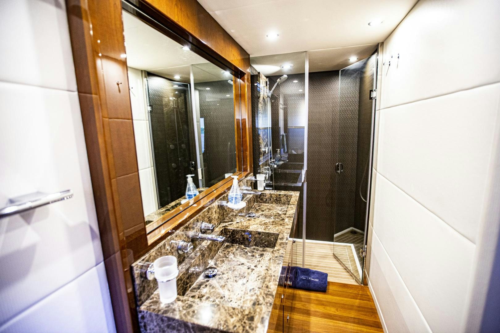 a bathroom with a large mirror aboard LAS BRISAS Yacht for Sale