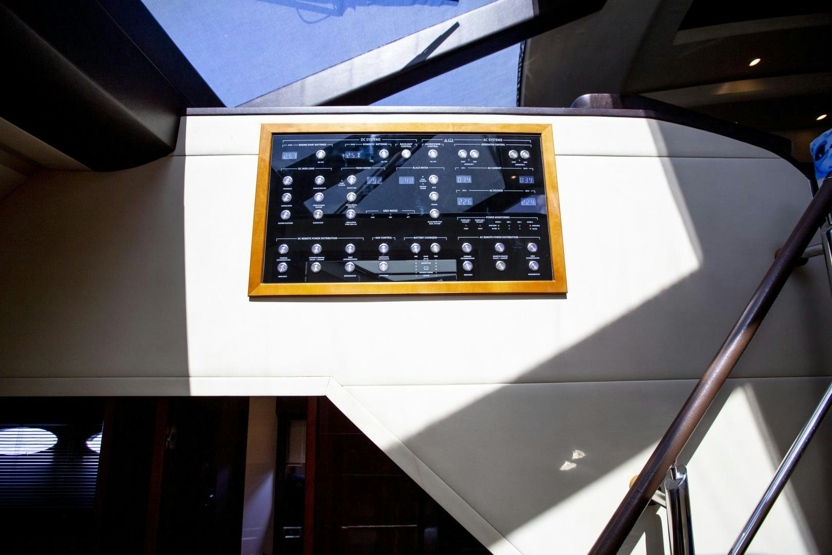 a digital clock on a wall aboard LAS BRISAS Yacht for Sale