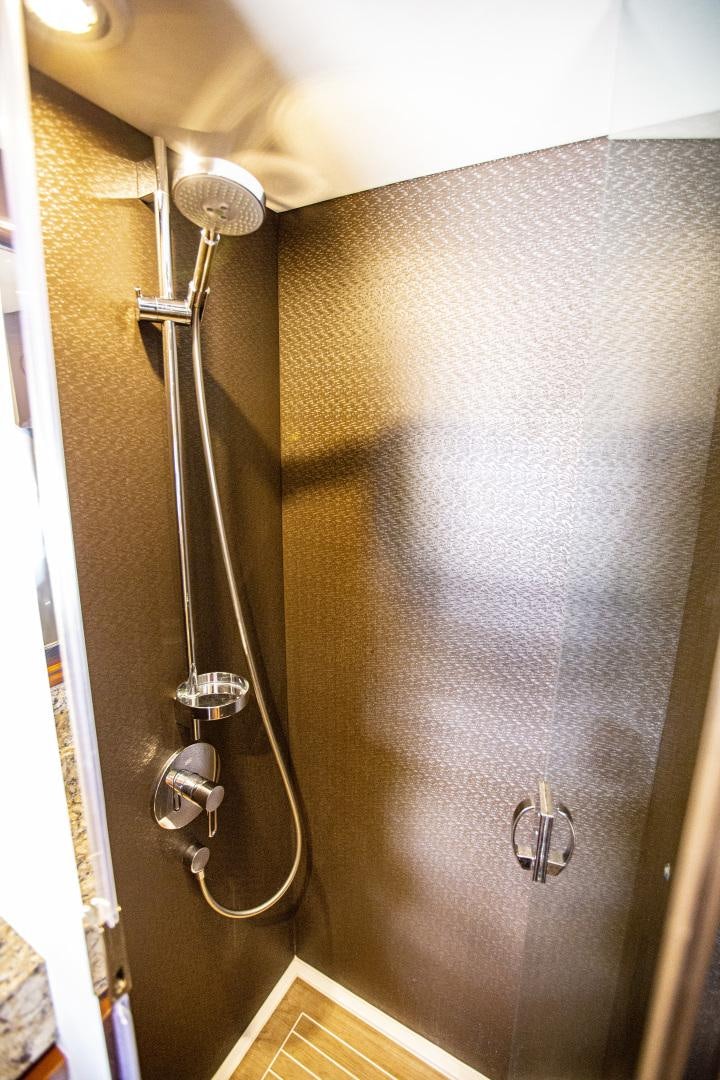 a shower with a metal handle aboard LAS BRISAS Yacht for Sale