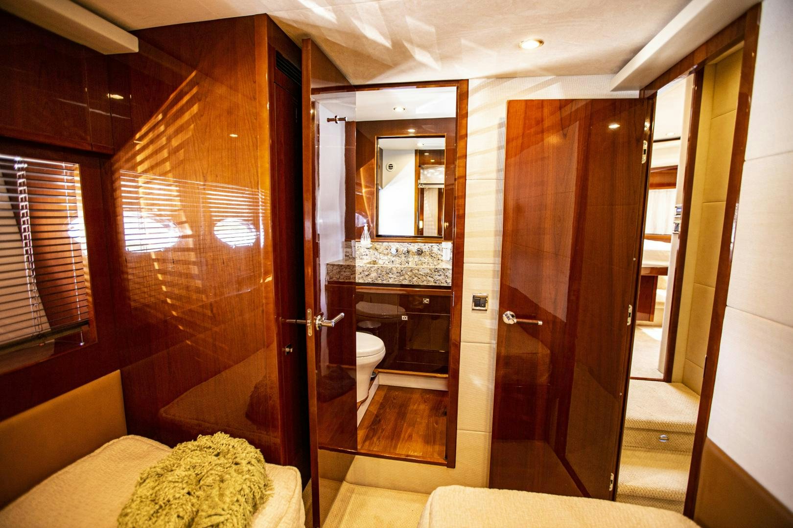 a room with a large mirror and a bed aboard LAS BRISAS Yacht for Sale