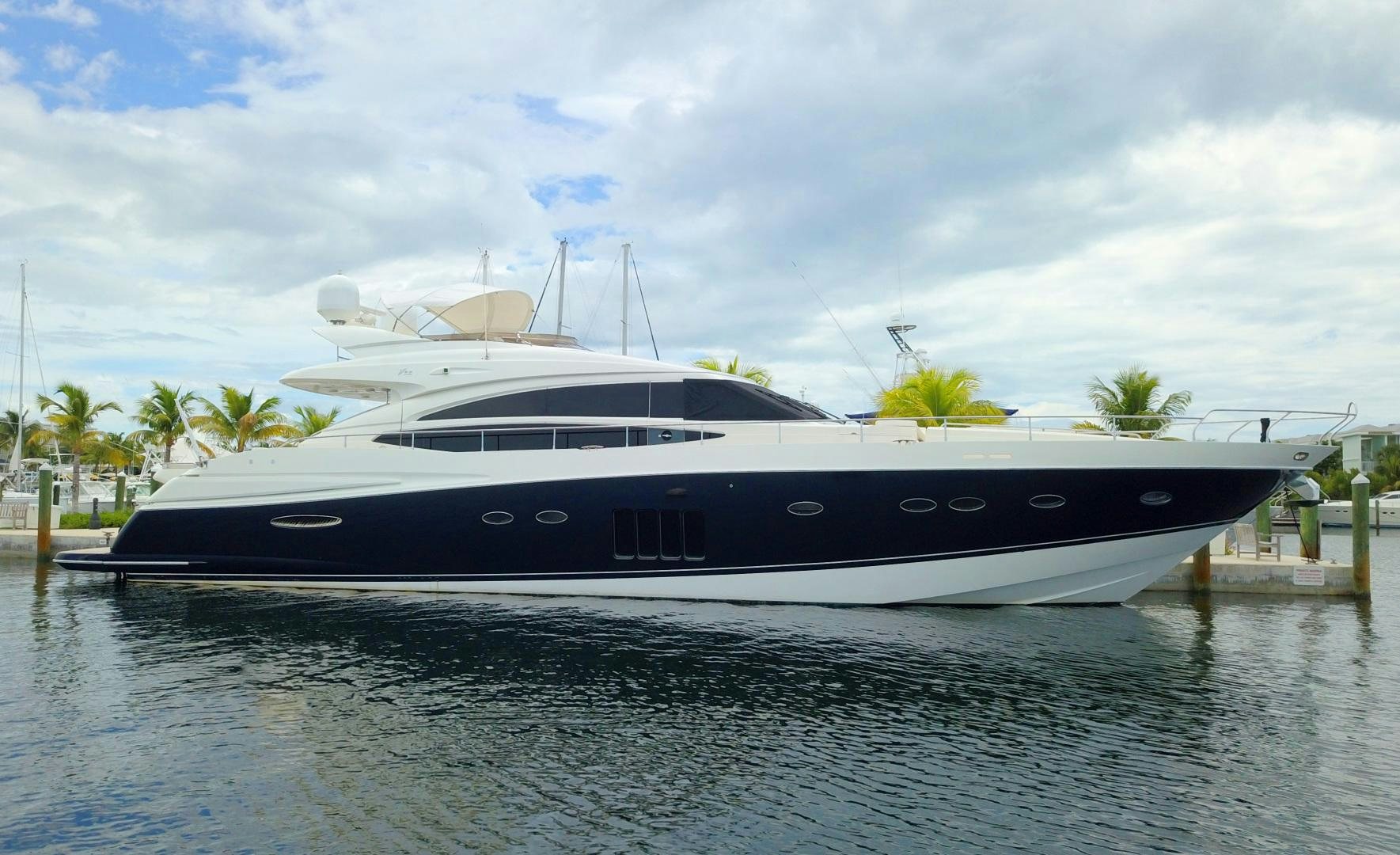 a yacht docked at a dock aboard LAS BRISAS Yacht for Sale