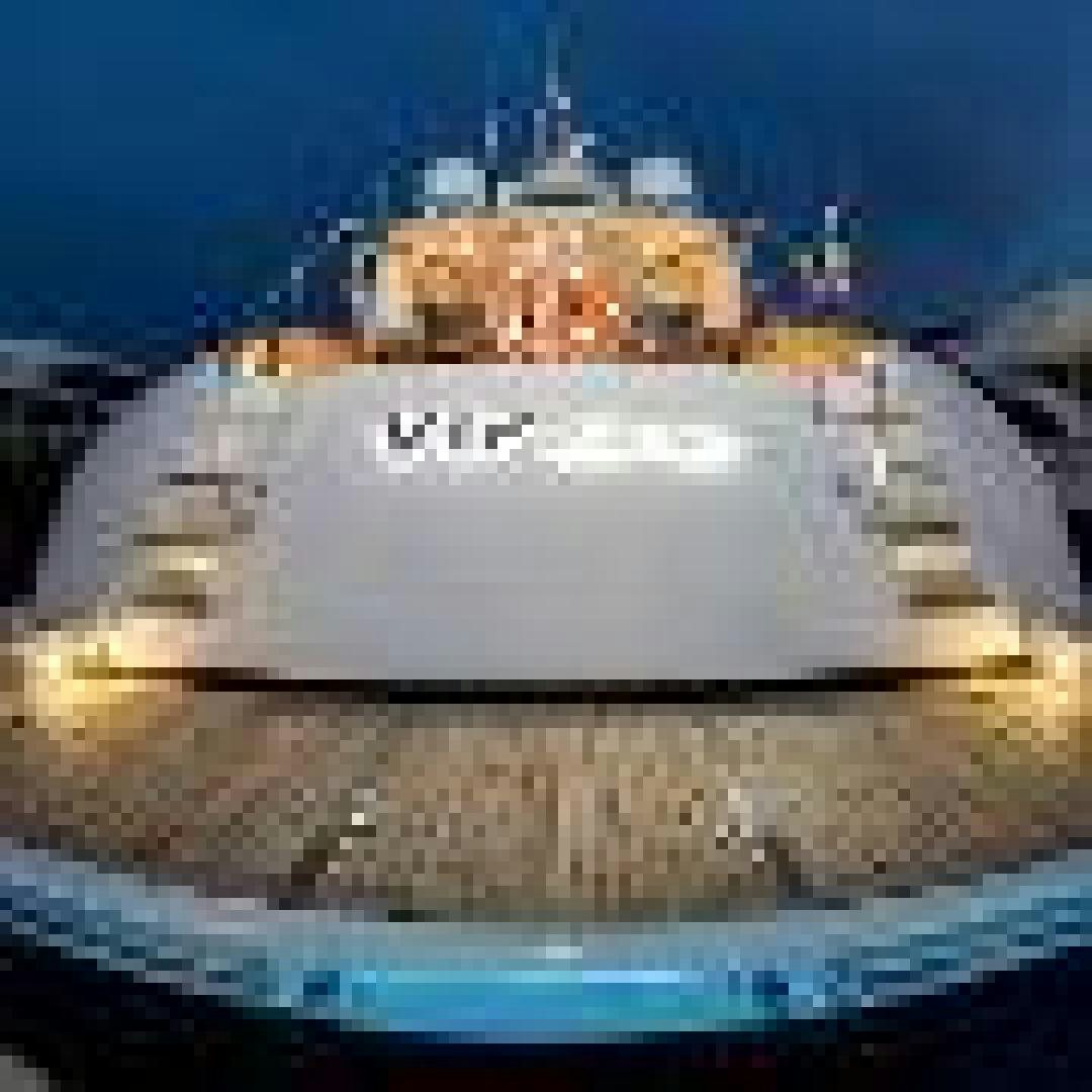 a large building with a large tower aboard VIP ONE Yacht for Sale