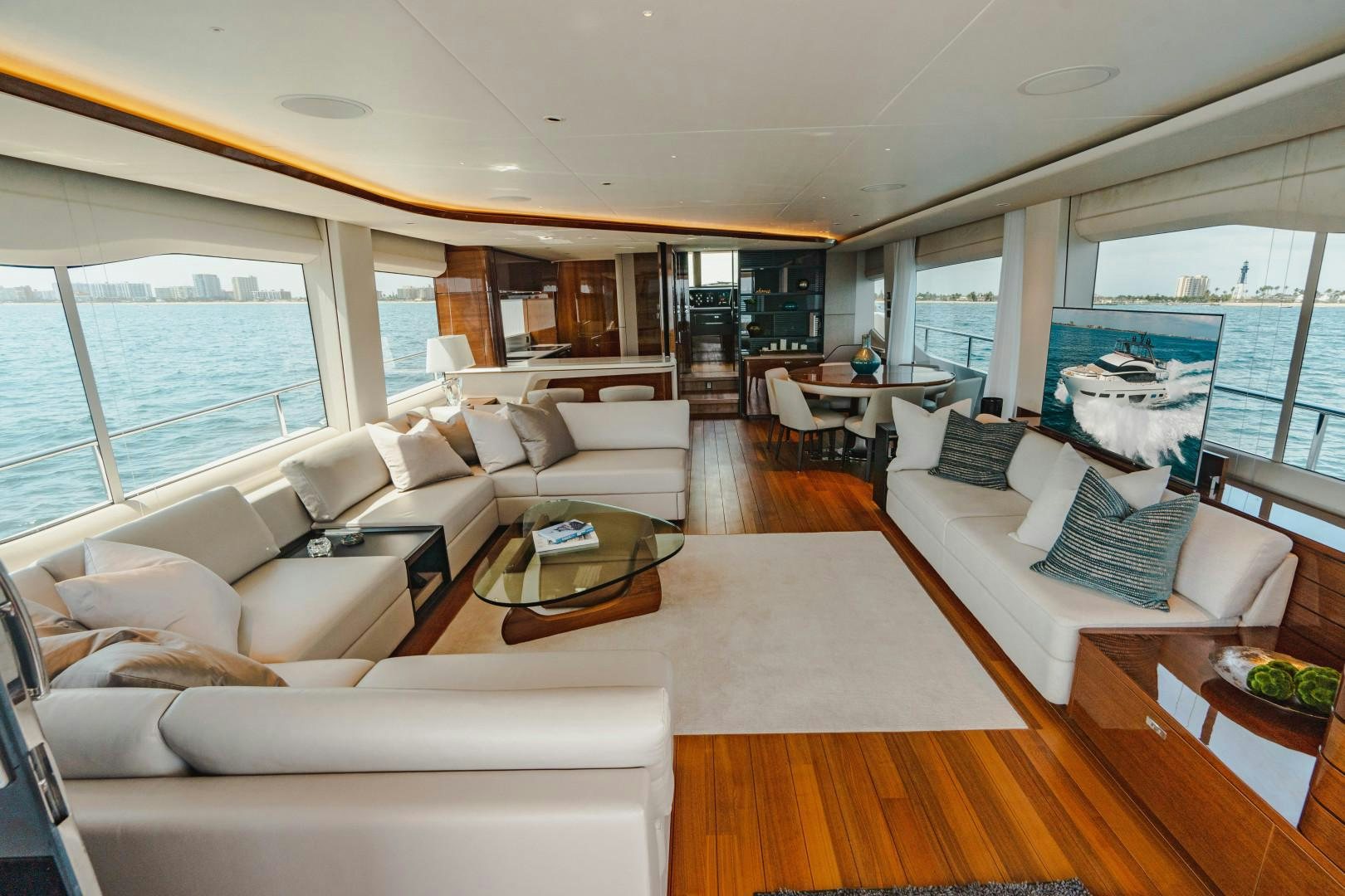 a living room with a large window aboard KAOS Yacht for Sale