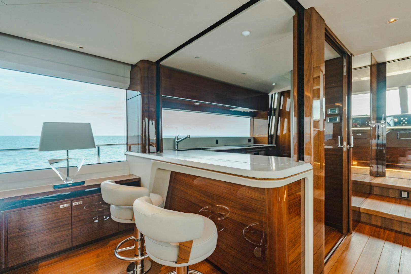 a room with a large glass door aboard KAOS Yacht for Sale