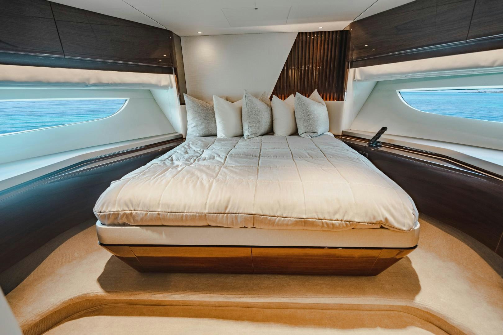 a bed with a large bed aboard KAOS Yacht for Sale