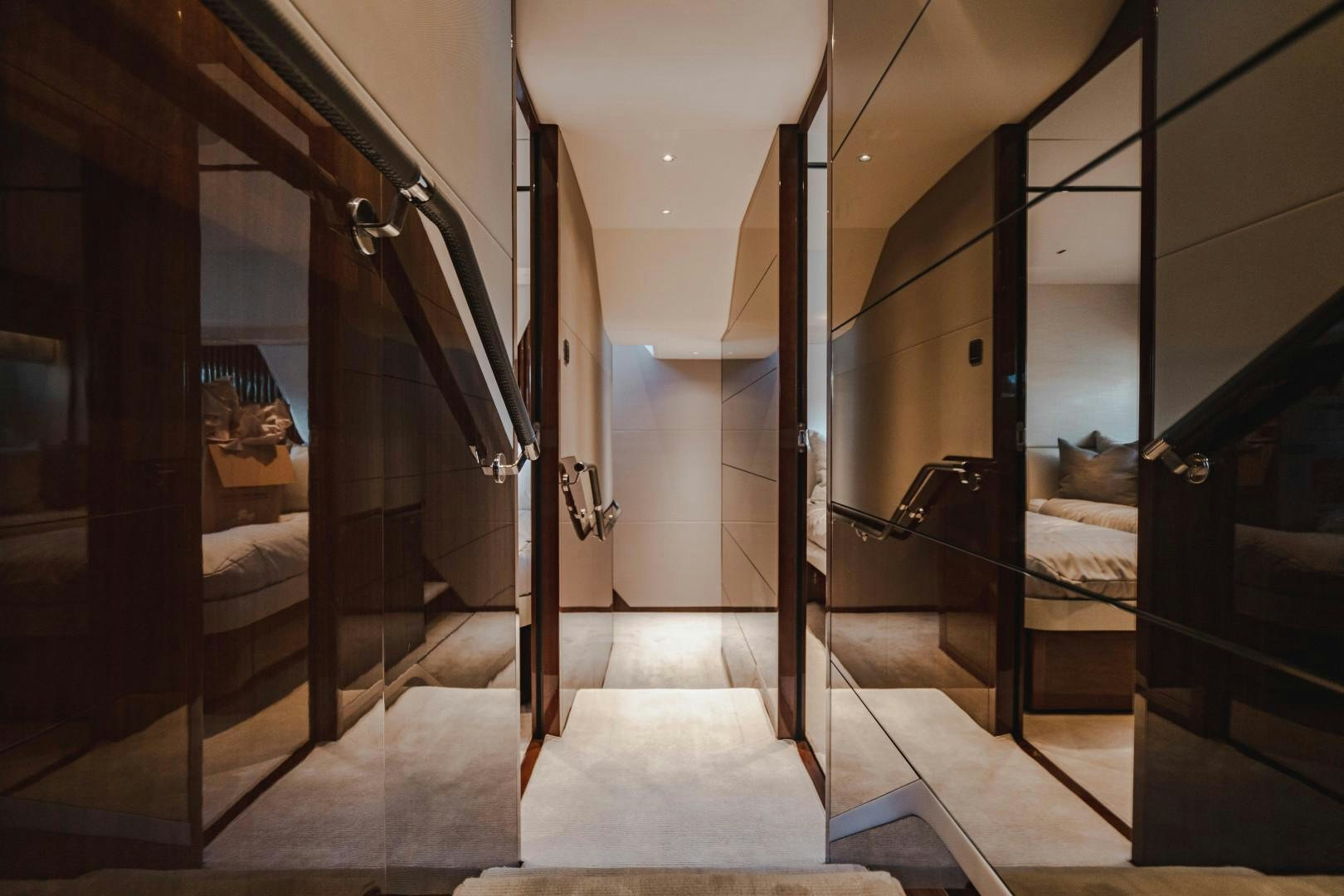 a room with a bed and a door aboard KAOS Yacht for Sale