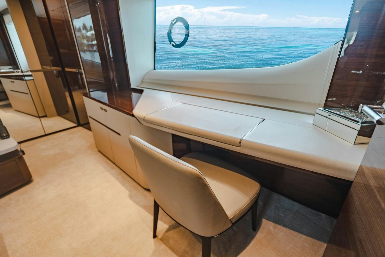 a room with a desk and a window aboard KAOS Yacht for Sale