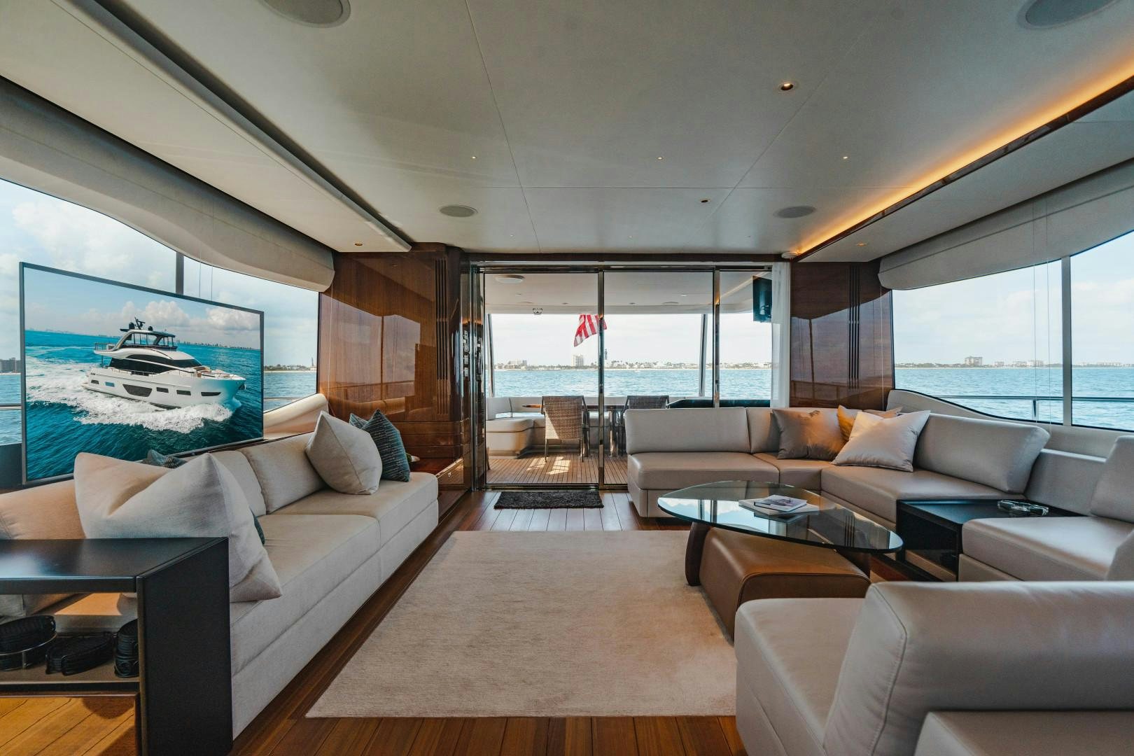 a living room with a large window aboard KAOS Yacht for Sale