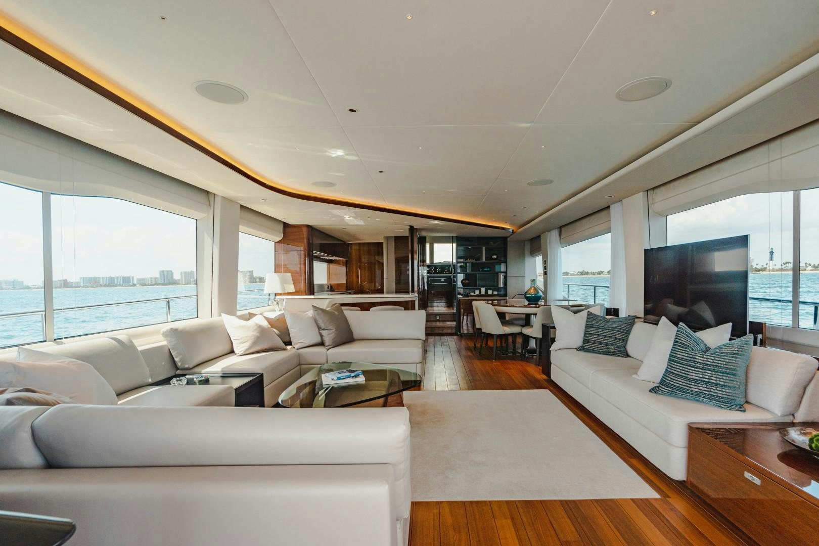 a living room with a large window aboard KAOS Yacht for Sale