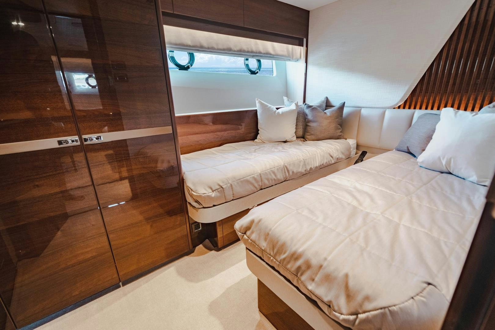 a room with two beds aboard KAOS Yacht for Sale