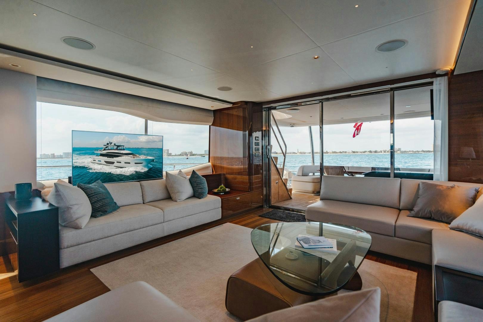 a living room with a large window aboard KAOS Yacht for Sale
