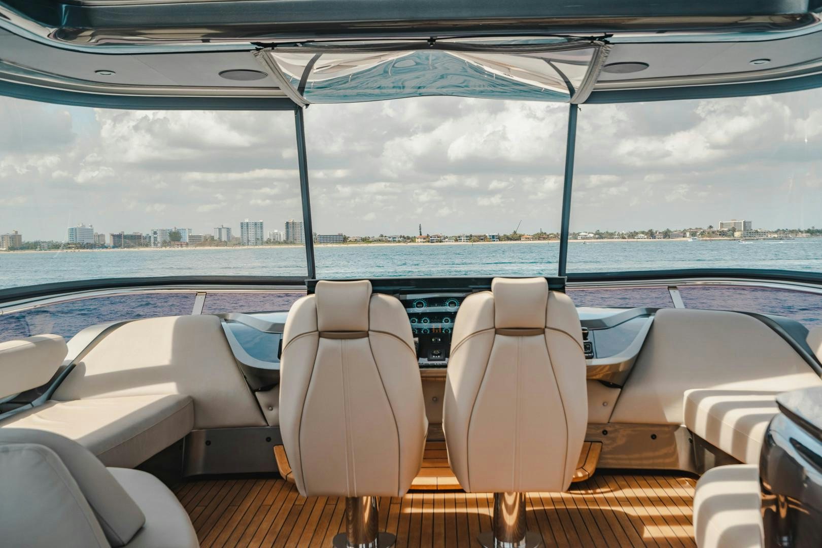 a boat with seats on the deck aboard KAOS Yacht for Sale