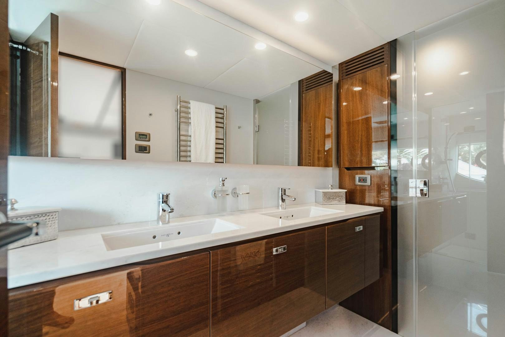 a bathroom with a large countertop aboard KAOS Yacht for Sale