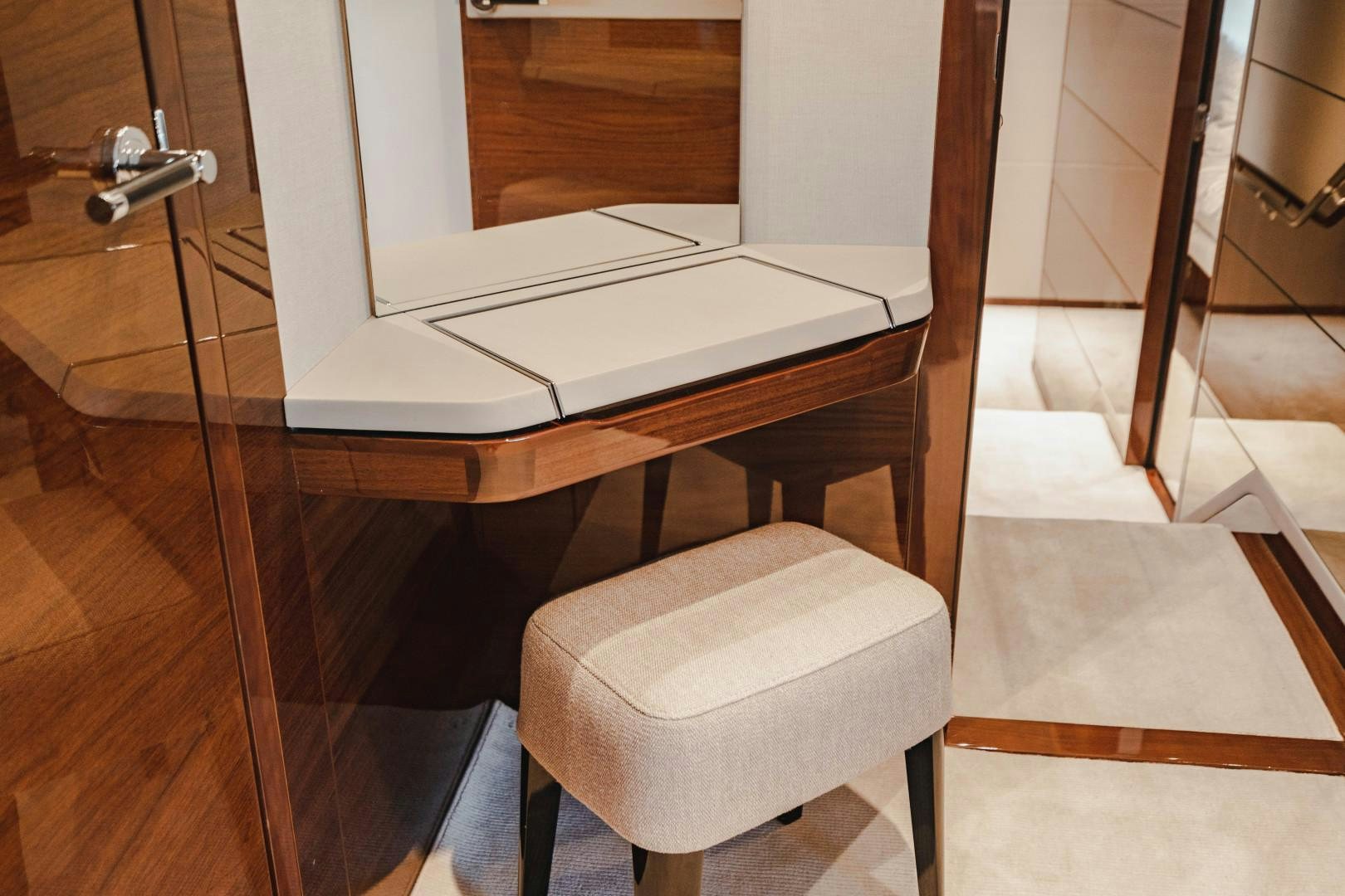 a table with a lamp on it aboard KAOS Yacht for Sale