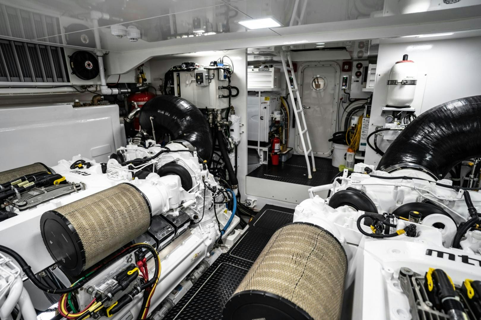 a room full of white and black machinery aboard MAKE  HAPPEN Yacht for Sale