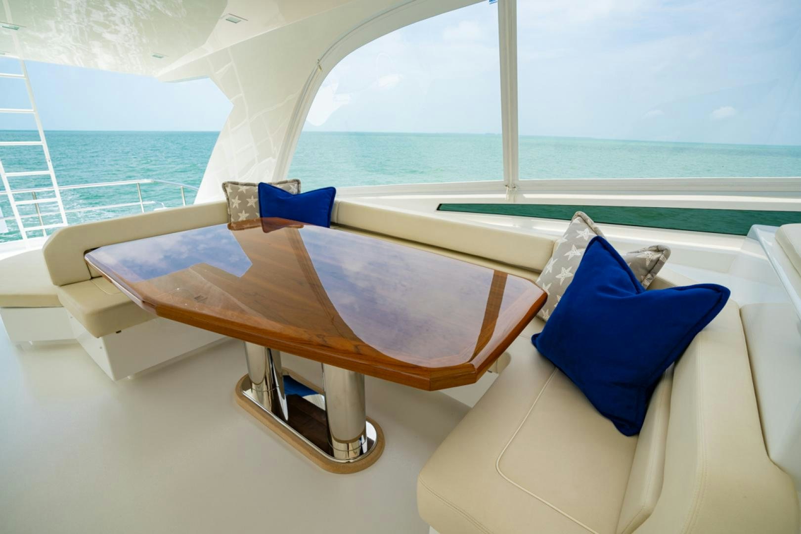 a room with a bed and pillows aboard MAKE  HAPPEN Yacht for Sale