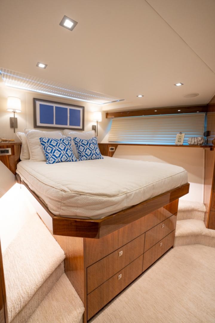 a room with a bed and a window aboard MAKE  HAPPEN Yacht for Sale