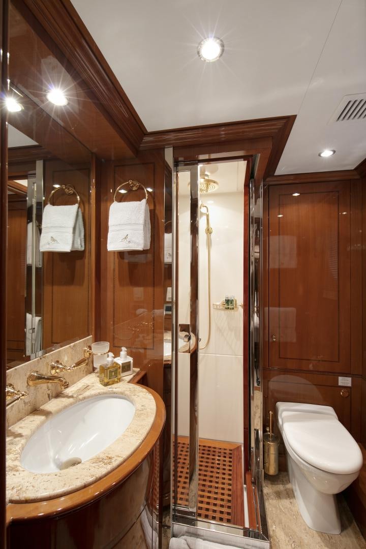 a bathroom with a sink and a toilet aboard FARFALLINA Yacht for Sale