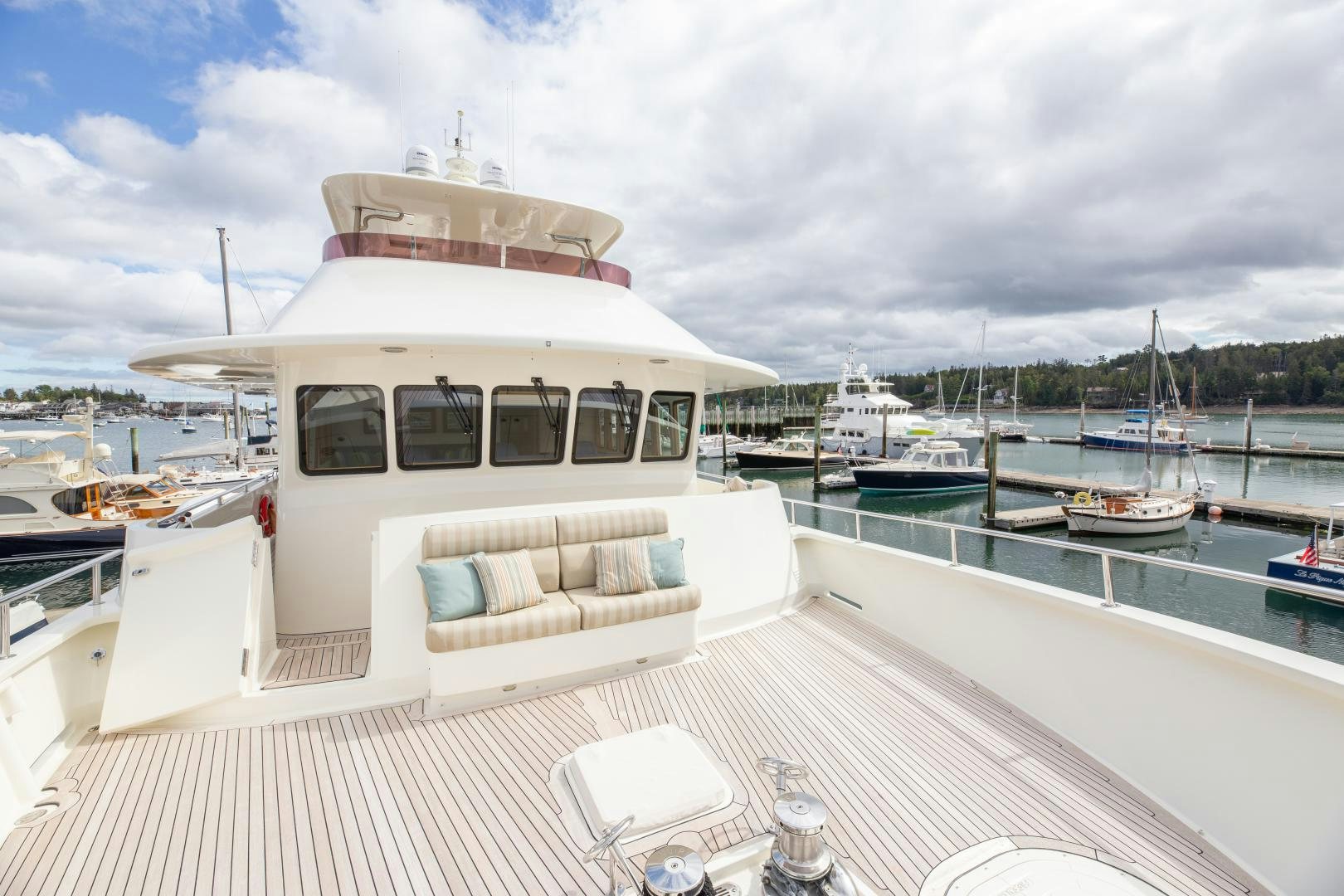 a boat docked at a pier aboard ISLANDER Yacht for Sale