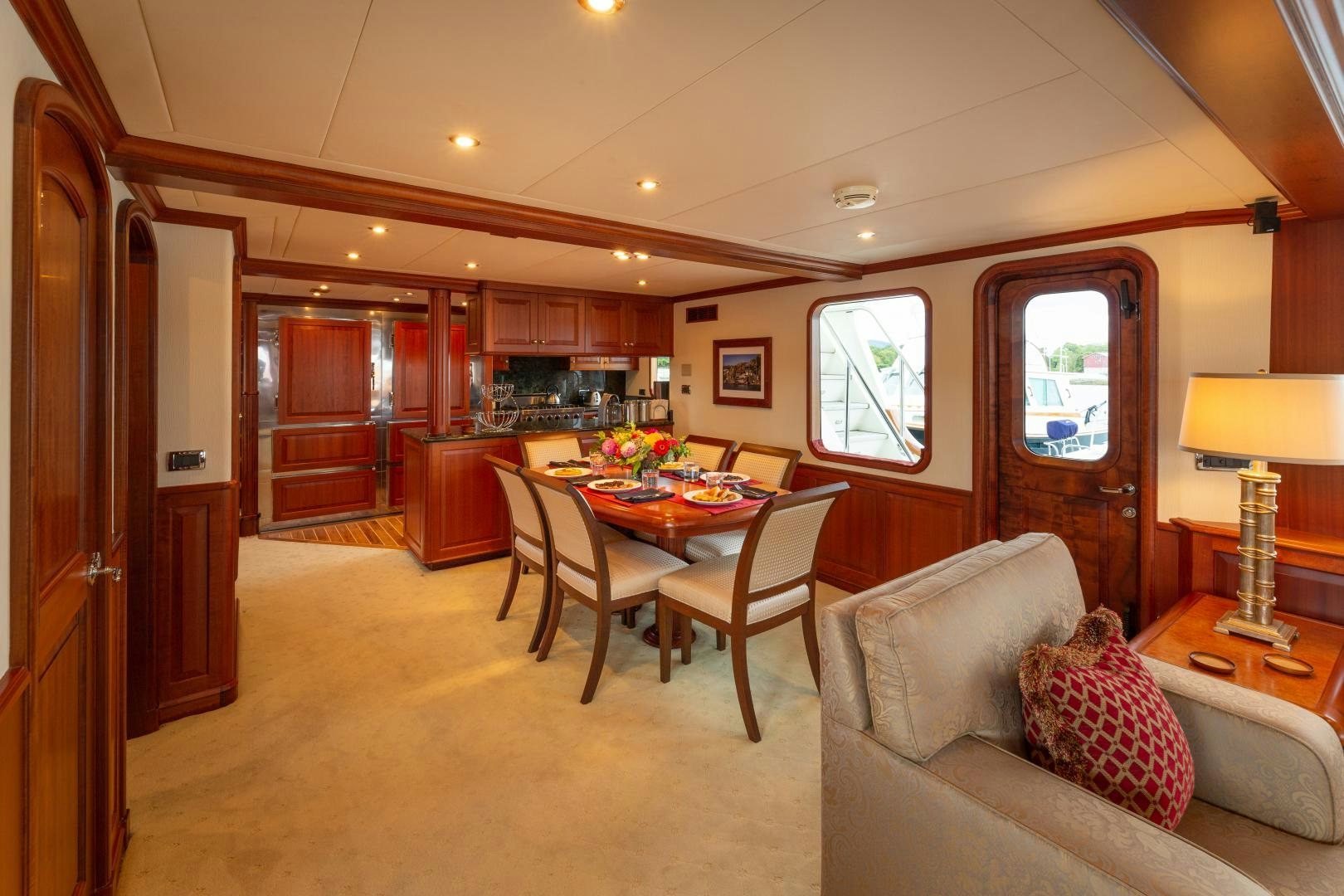 a living room with a couch and a table aboard ISLANDER Yacht for Sale