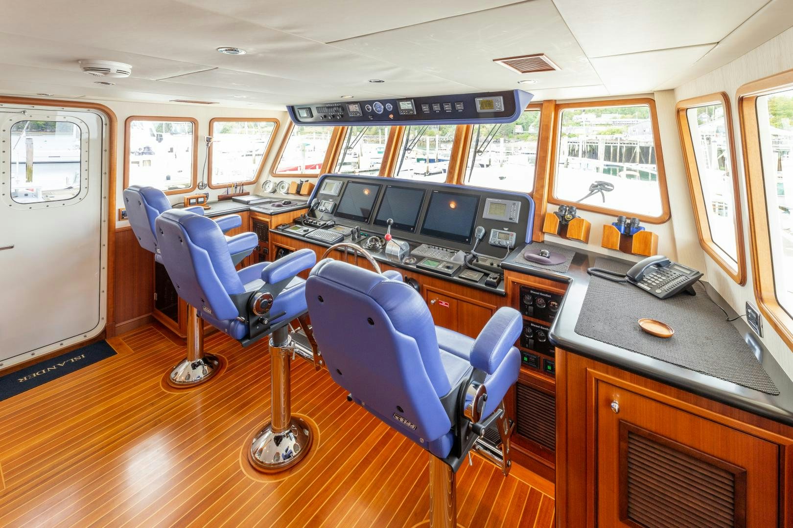 a control room with many computers aboard ISLANDER Yacht for Sale