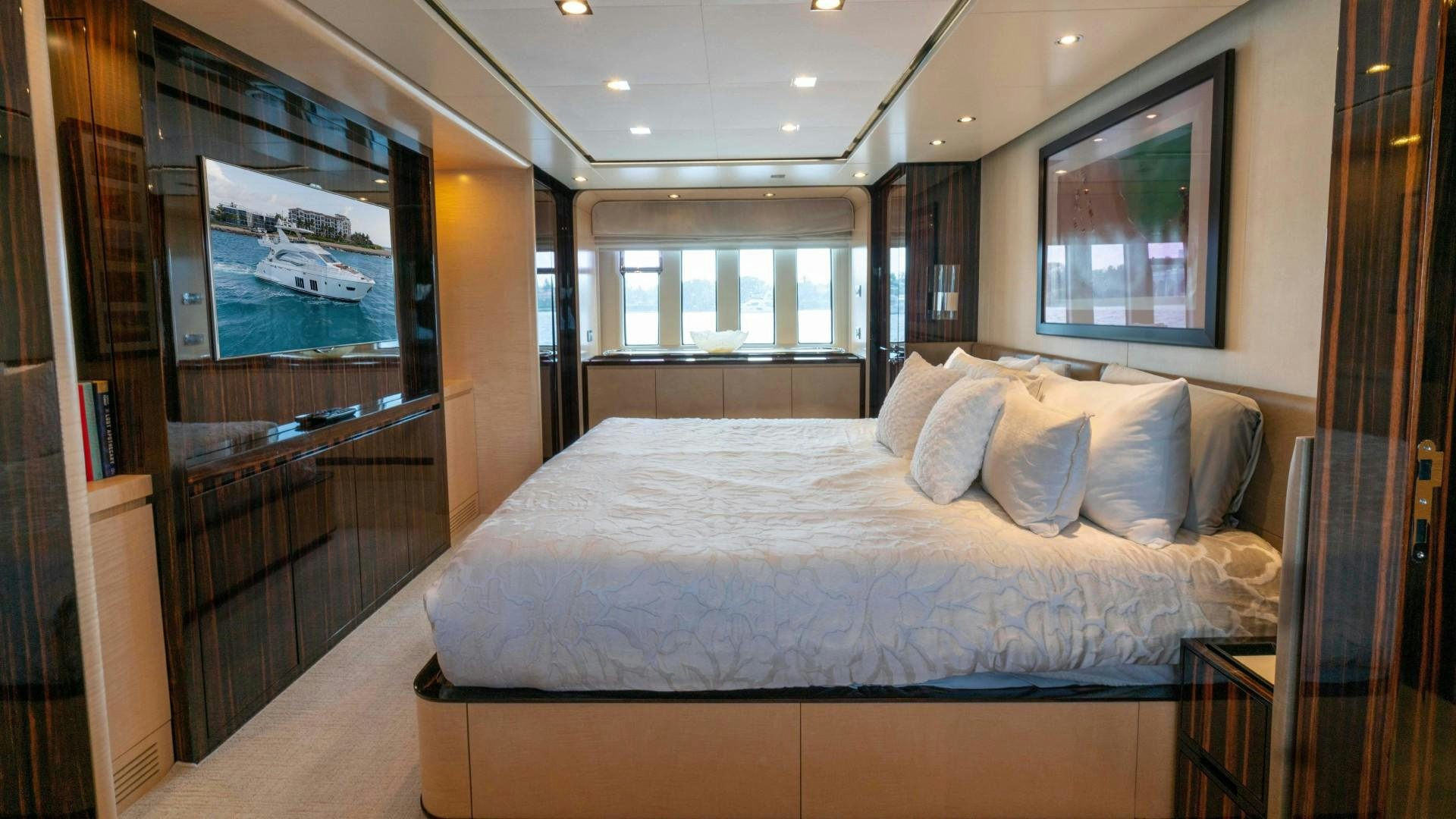 a bed in a room aboard PHOENIX Yacht for Sale