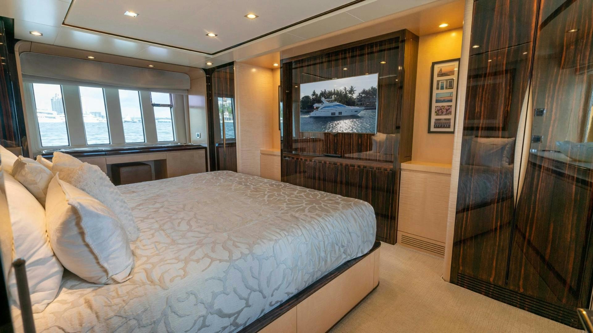 a bed in a room aboard PHOENIX Yacht for Sale