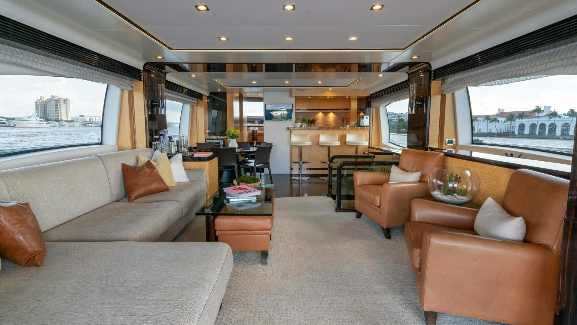 a living room with a couch and a table aboard PHOENIX Yacht for Sale