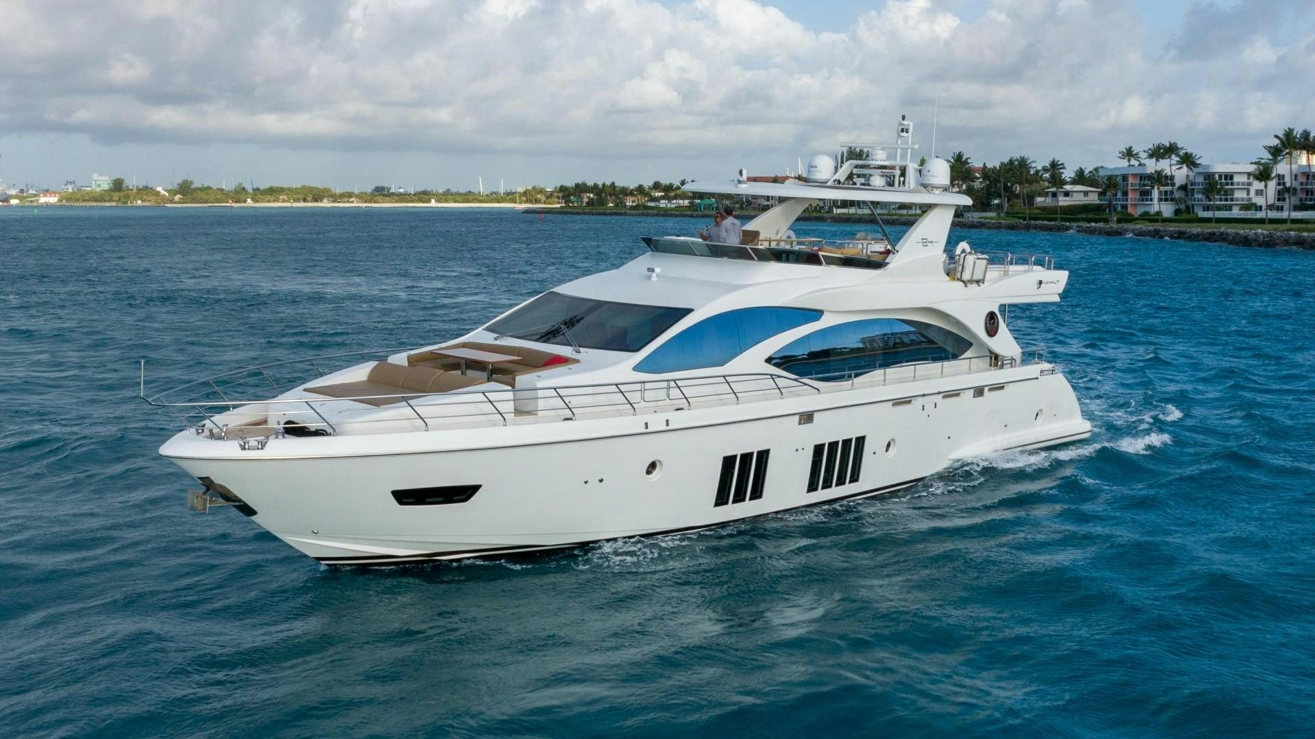a white yacht in the water aboard PHOENIX Yacht for Sale