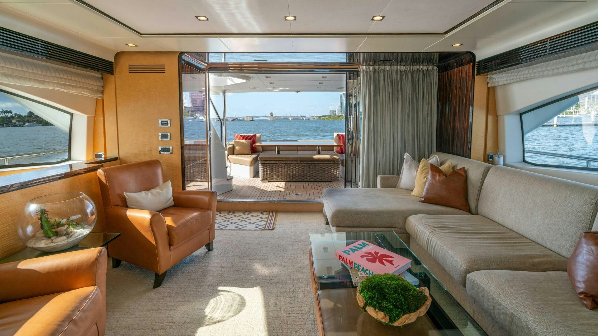 a living room with a large window aboard PHOENIX Yacht for Sale