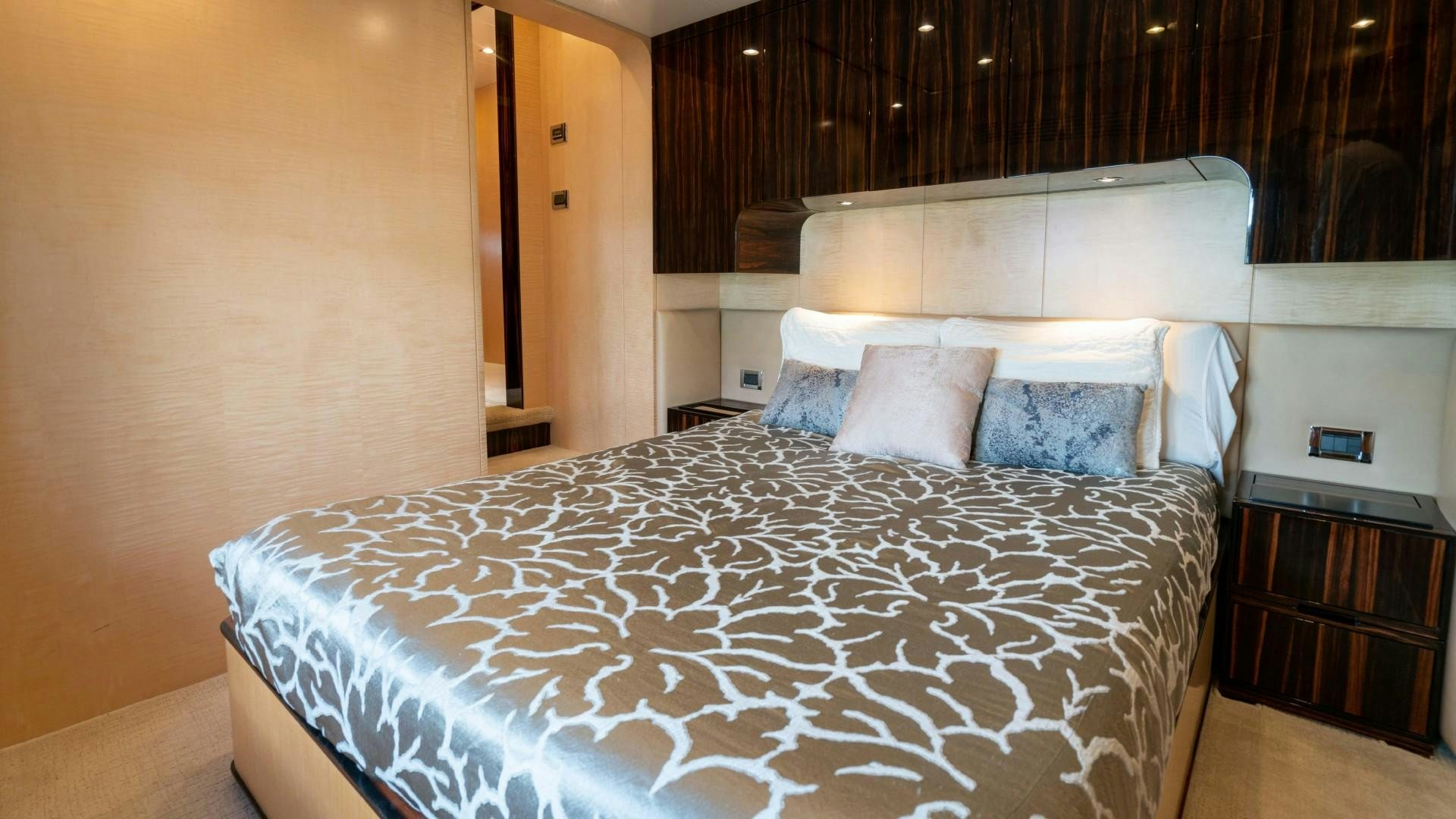 a bed in a room aboard PHOENIX Yacht for Sale