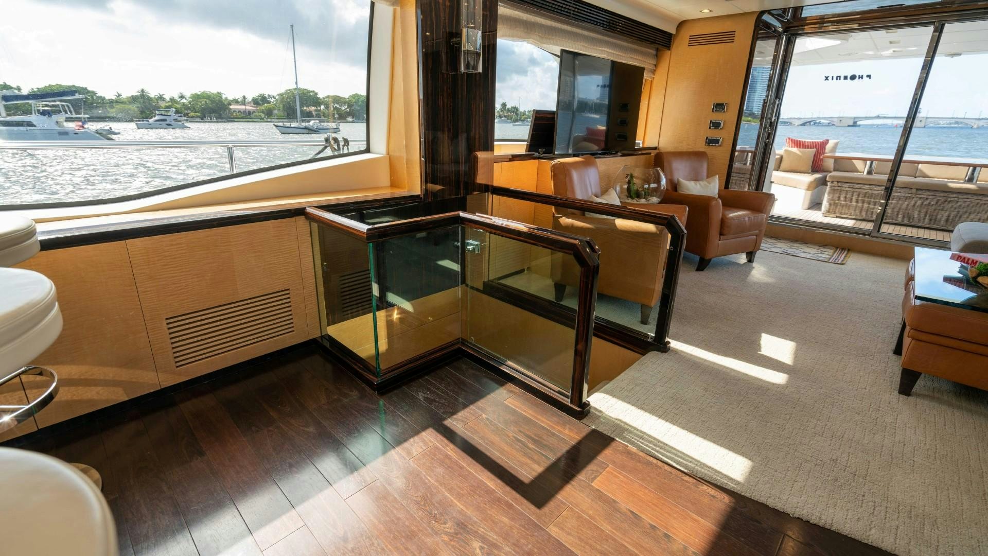 a room with a table and chairs aboard PHOENIX Yacht for Sale