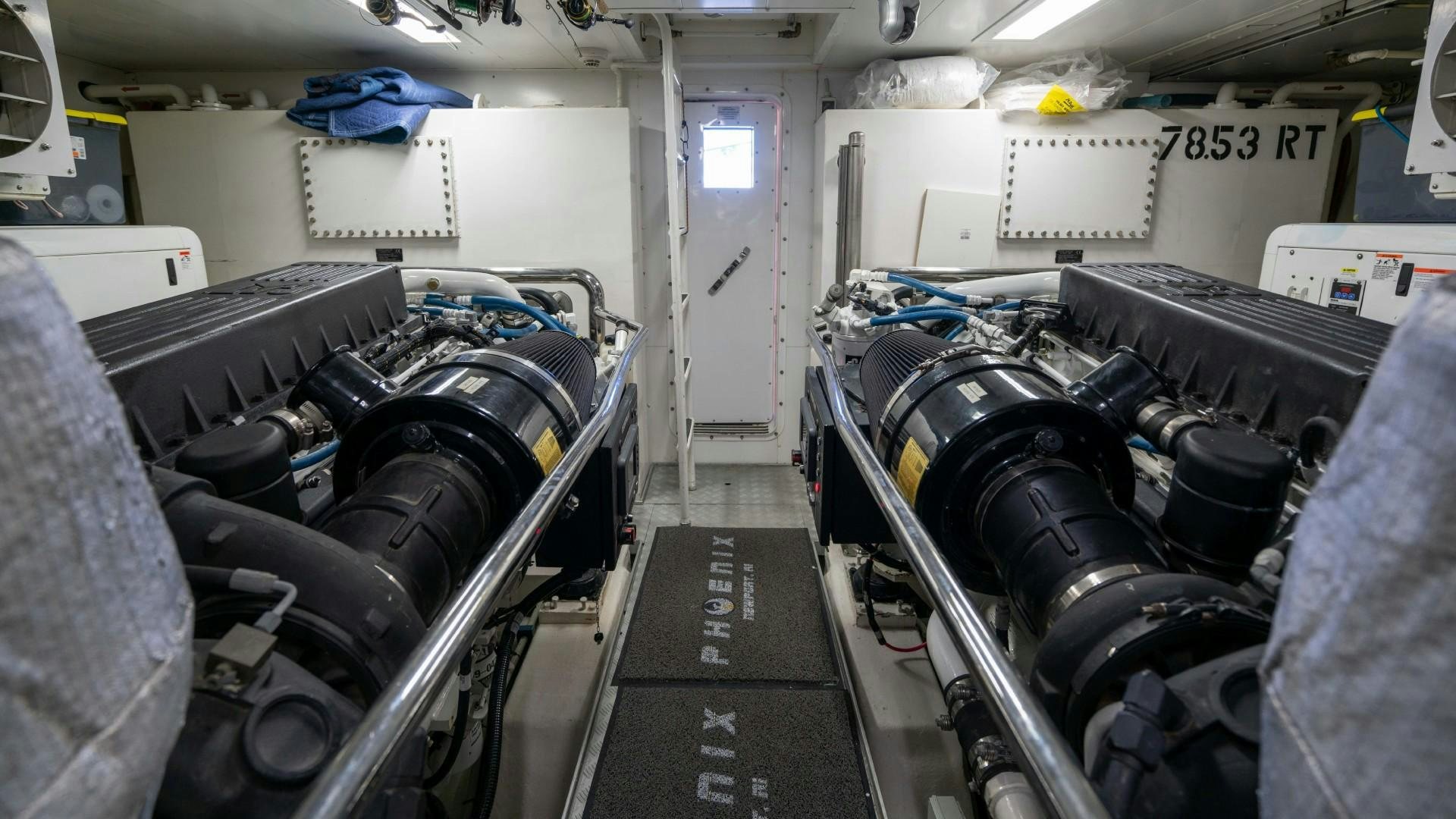 a room with a large group of black and silver machinery aboard PHOENIX Yacht for Sale